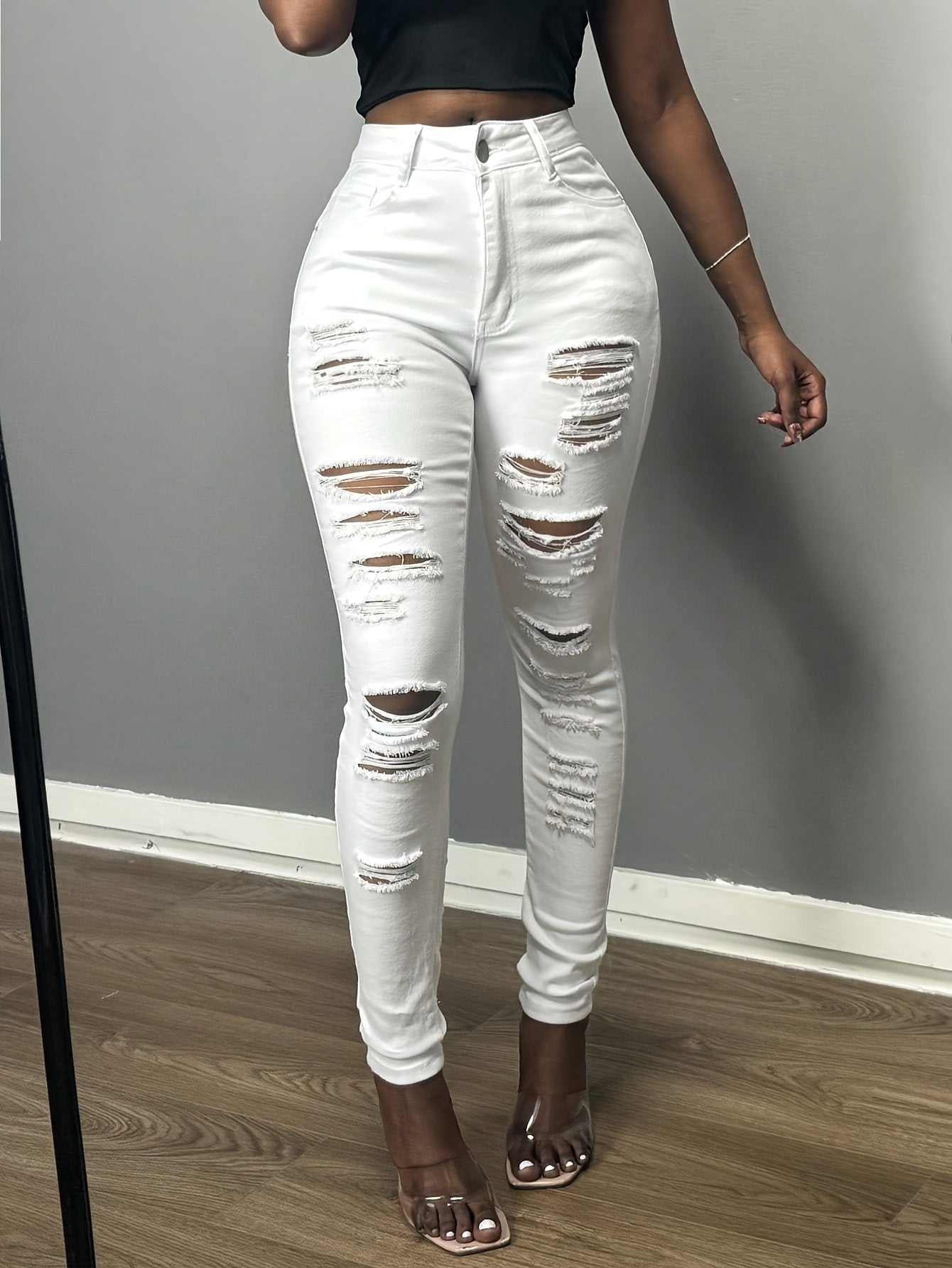 Elastic hole sexy Women's jeans feet pants